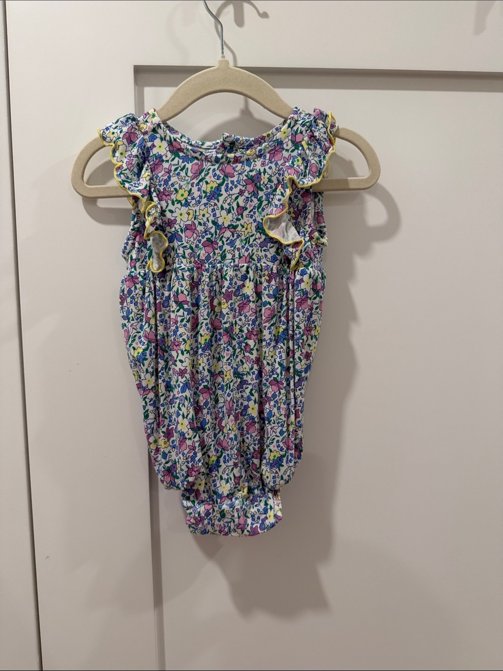 Magnetic Me- Baby Floral Ruffle Sleeveless Romper in Multicolor
